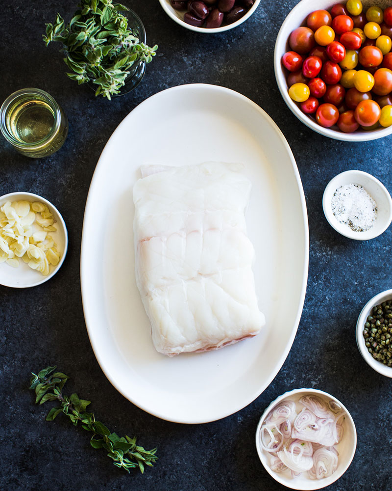 Raw halibut filet on a plate