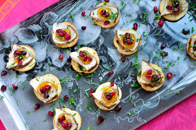 Crostini with Pork Tenderloin, Chutney and Pomegranate