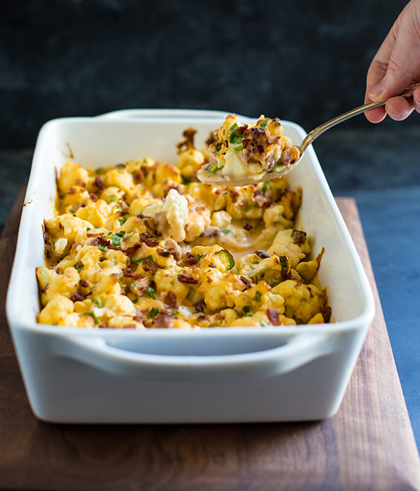 Cheesy Cauliflower Bake Being Scooped