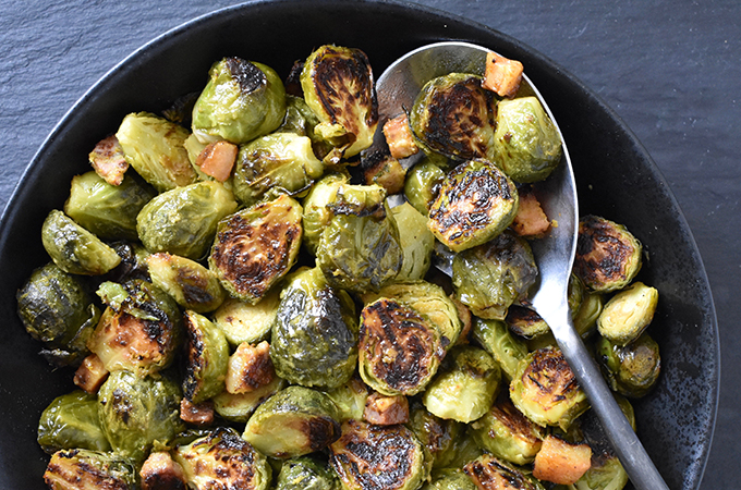 Roasted Brussels Sprouts with Lemongrass in Bowl with Spoon
