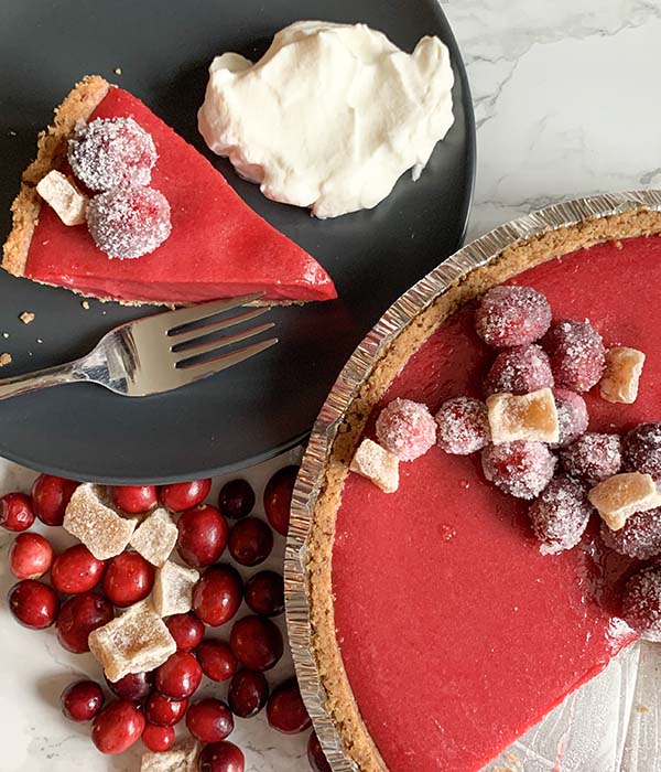 Cranberry Orange and Ginger Pie Slice with Sugared Cranberries and Whipped Cream