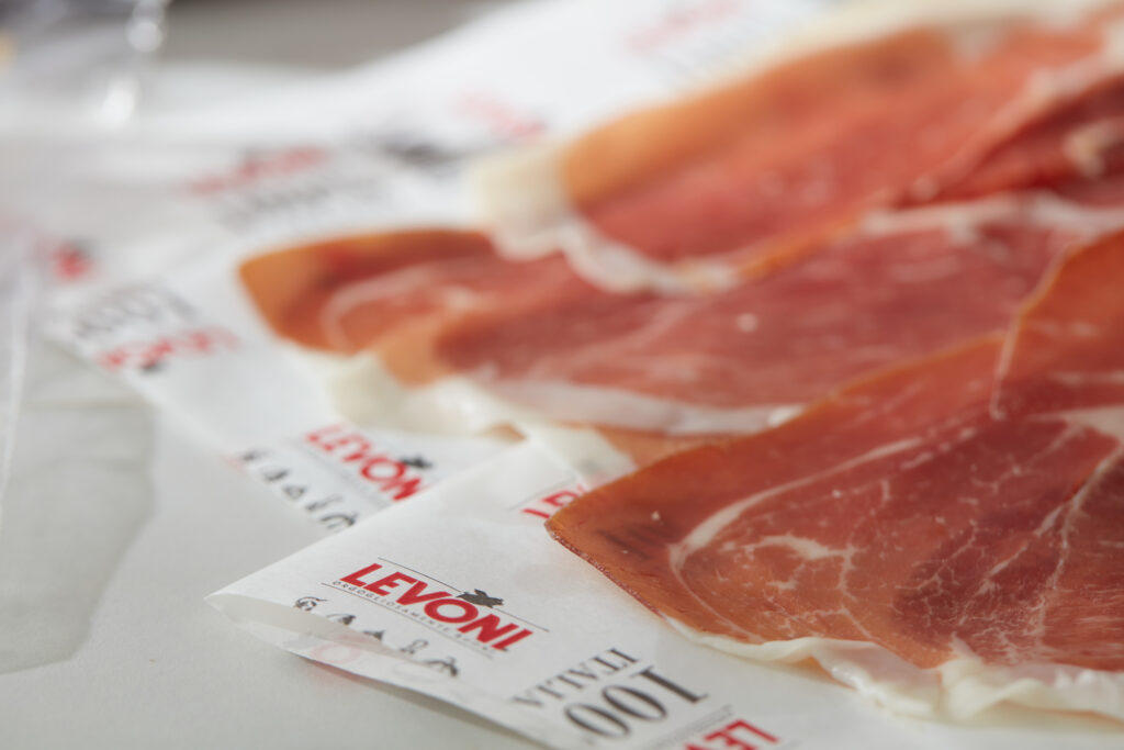 Levoni Sliced meats on white paper