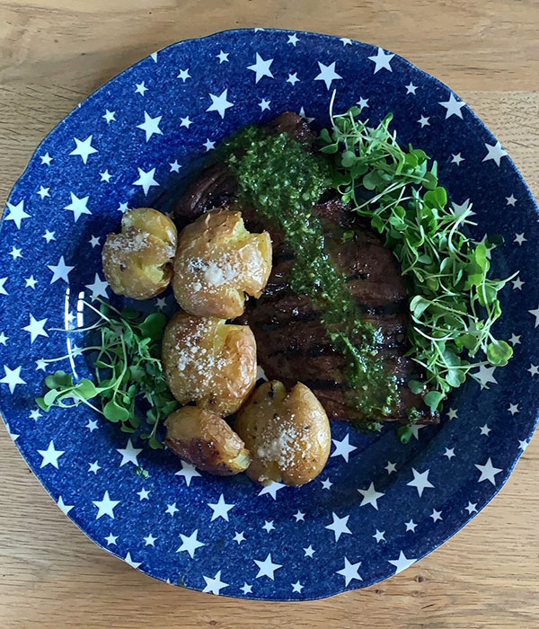 Grilled Skirt Steak with Smashed Potatoes and Chimichurri