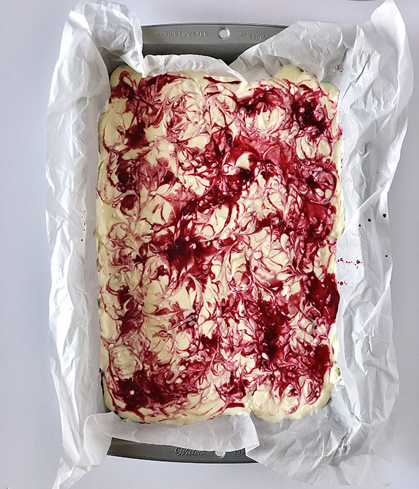 Blackberry Cheesecake Brownies Unbaked with Blackberry Swirl