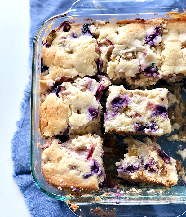 Thick, cake-like breakfast bars in a clear baking dish.