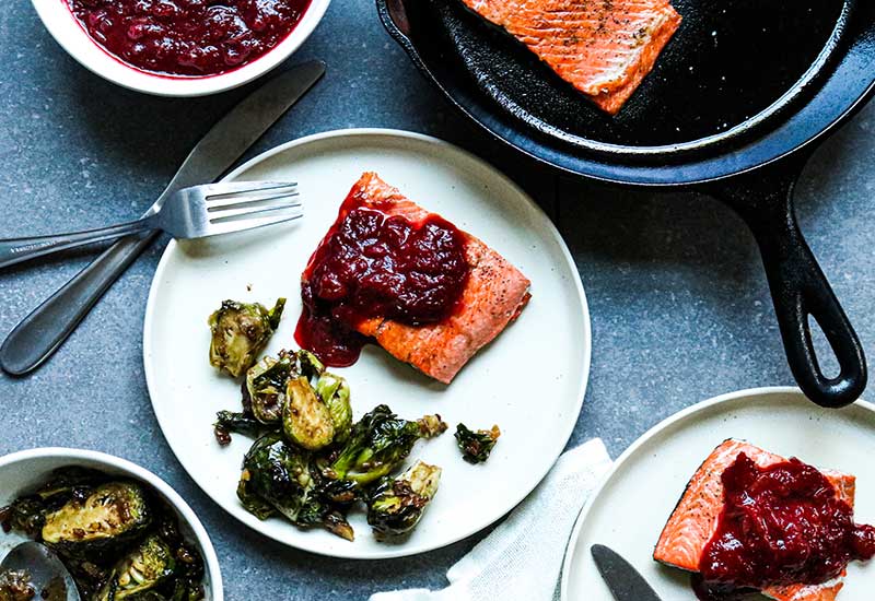 Pan-Seared Salmon with Spiced Cranberry Sauce and Brussels Sprouts Salad