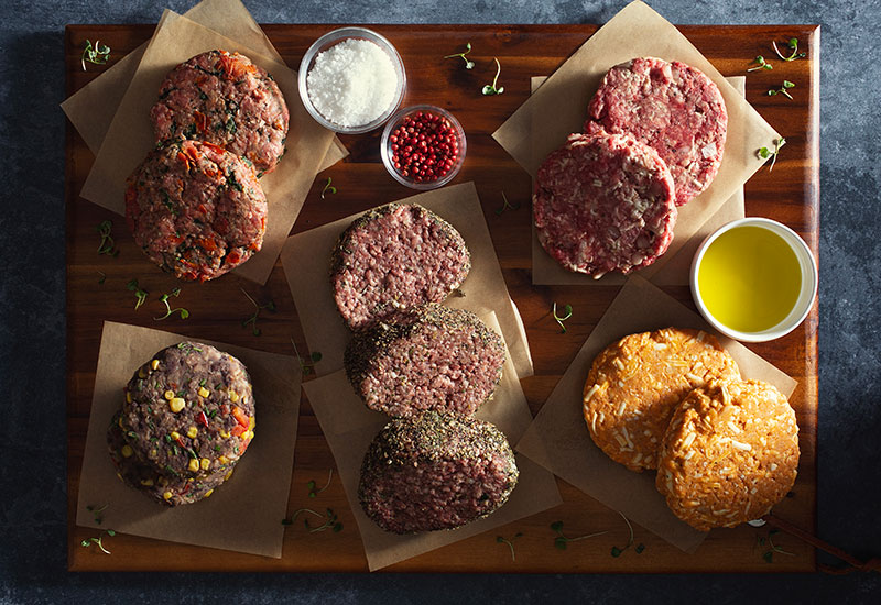 Burgers Done Better: 5 Heinen’s Premade Gourmet Burgers to Grill this Summer