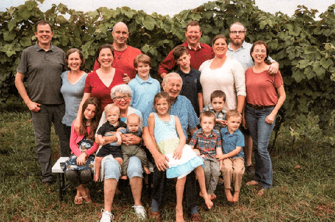 The Full Linehan Family in a Grape Orchard
