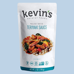 A Package of Kevin's Teriyaki Simmer Sauce on a Light Blue Background.