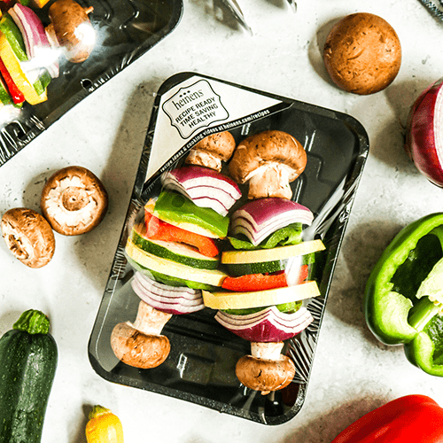A Package of Heinen's Vegetable Kabobs Surrounded by Fresh Produce