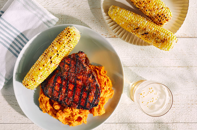 Grilled Center Cut Pork with corn on the cob and sweet mashed potatoes