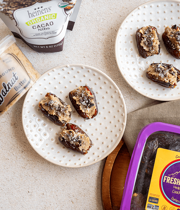 Two Plates with Chewy Walnut Butter Stuffed Dates