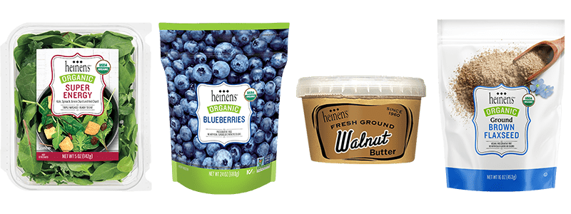 A Package of Heinen's Super Energy Salad Greens, A Bag of Heinen's Organic Frozen Blueberries, a Tub of Heinen's Fresh Ground Nut Butter, and a Bag of Heinen's Ground Flaxseed