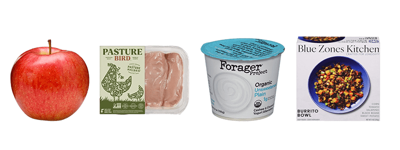 A Whole Fresh Apple, a Package of Pasturebird Chicken, a Cup of Forager Organic Plain Yogurt, a Blue Zones Kitchen Burrito Bowl