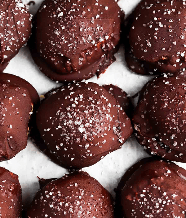 An Assortment of Chocolate Buckeye Balls with Sea Salt on Top
