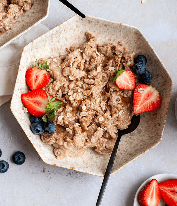 A Bowl of Maple Cinnamon Slow Cooker Oatmeal with Fresh Fruit