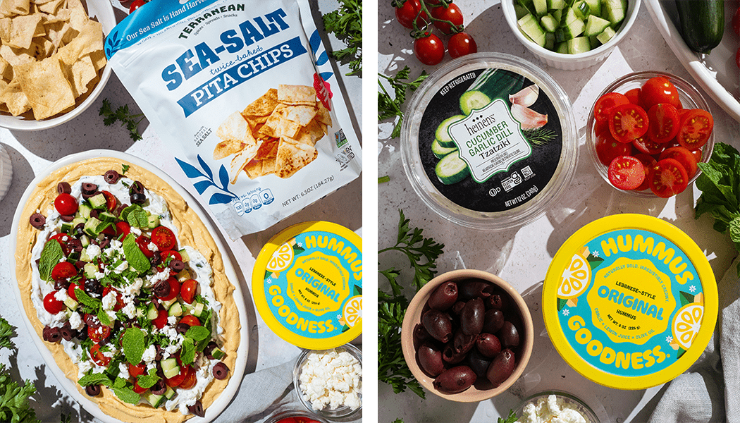 Mediterranean 7 Layer Dip surrounded by its fresh ingredients