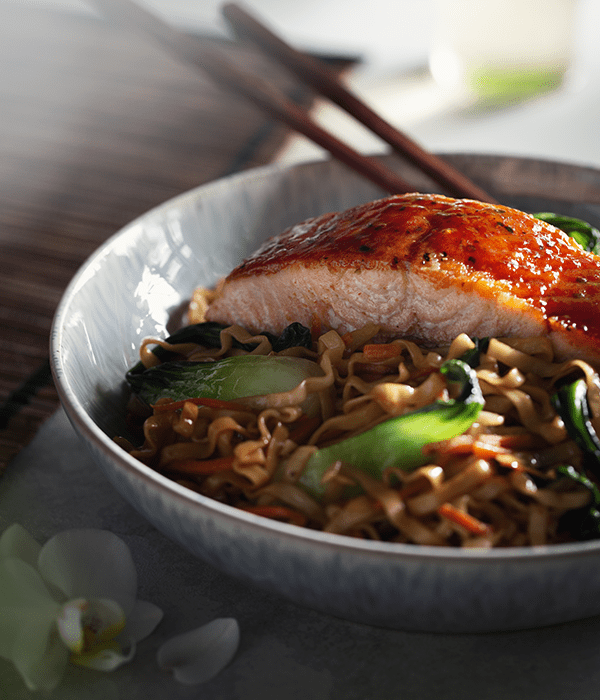 Plum Glazed Salmon Bowl in a dish with chopsticks