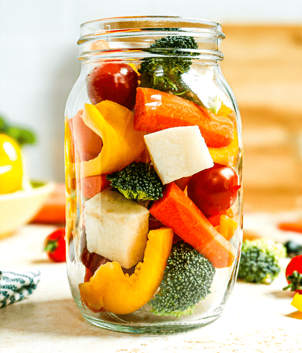 the magic veggie jar  filled with healthy vegetables in a jar