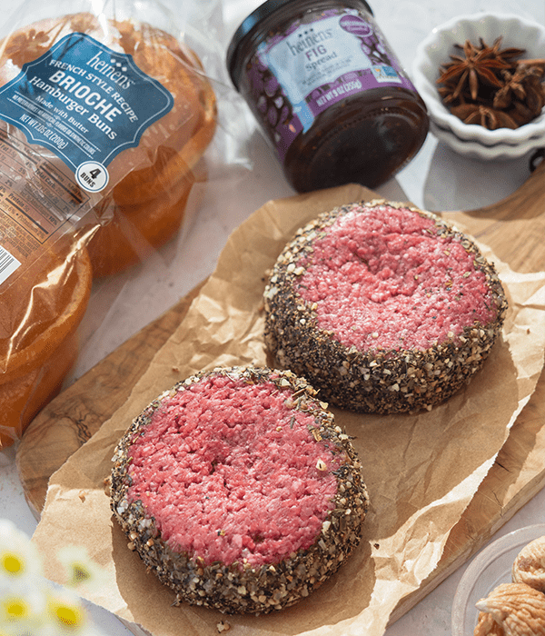 Gourmet Steakhouse Burger from Heinens shown alongside some Heinen's Brioche Hamburger Buns