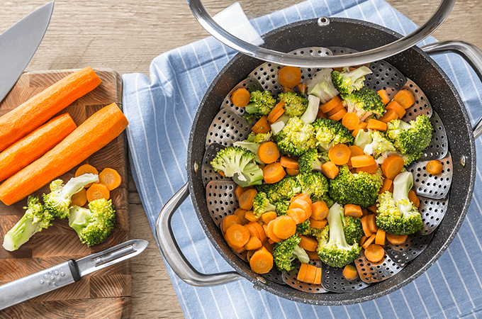 steamed vegetables in a pot ready to be served