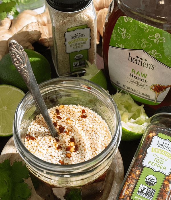 Yoko's kitchen Cold Soba Noodle Salad ingredients laid out. Heinen's raw honey, red pepper & sesame seed