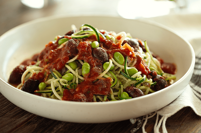 Veggie Pasta Marinara plated on a table