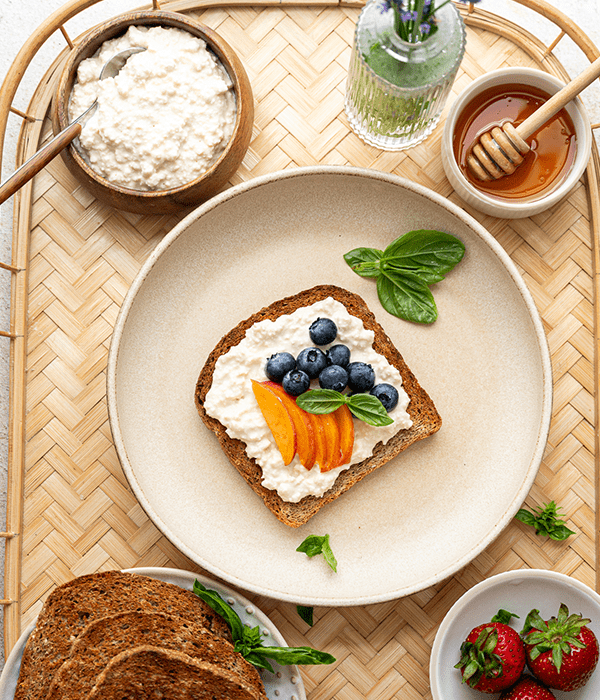 Vegan Tofu “Cottage Cheese” plated with some fresh flowers
