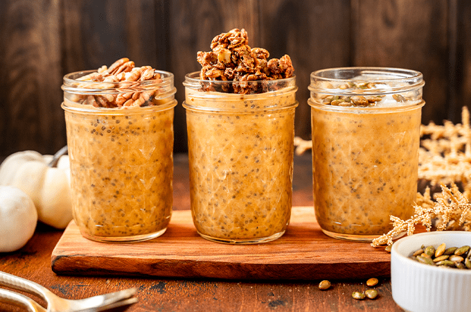 Pumpkin Chia Seed Pudding served on a wooden slab