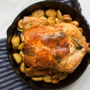 Roasted Whole Chicken over Potatoes