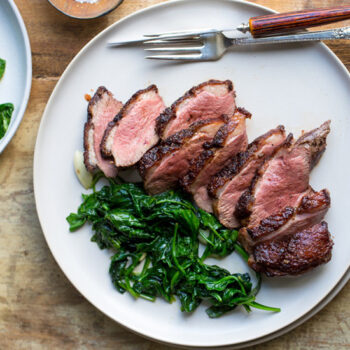 Duck and wilted spinach