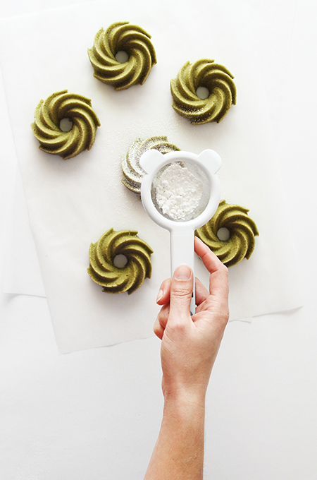 Matcha Tea Cakes Being Sprinkled with Sugar