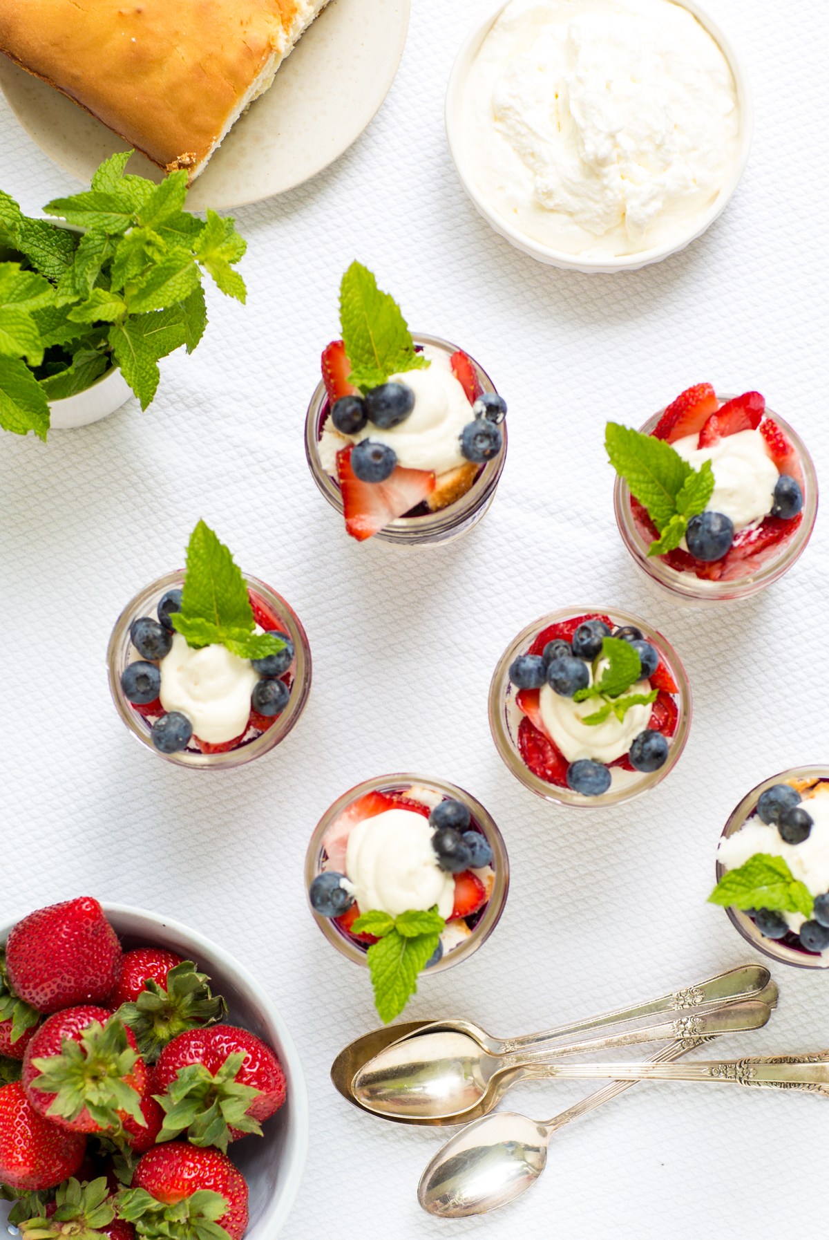 Angelfood and berry parfaits in glass jars