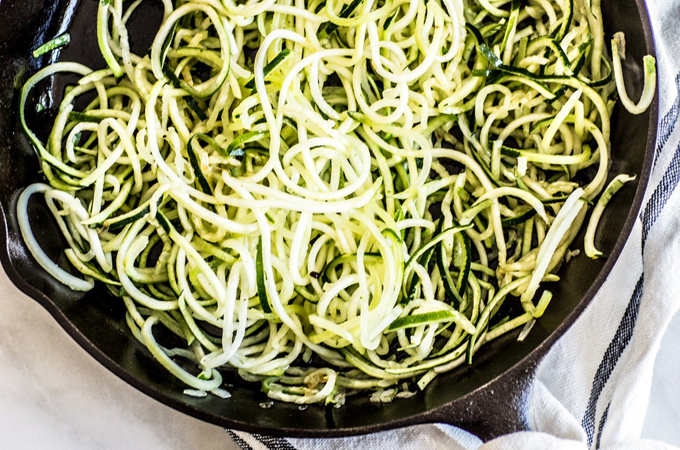 Uncooked Zucchini Noodles in Skillet