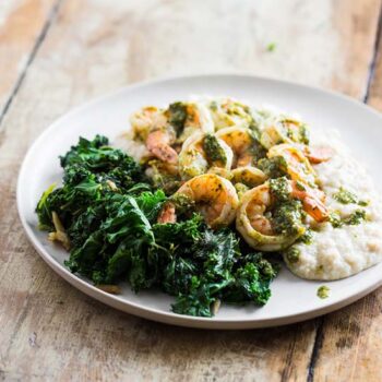 Shrimp and cauliflower mash with wilted greens