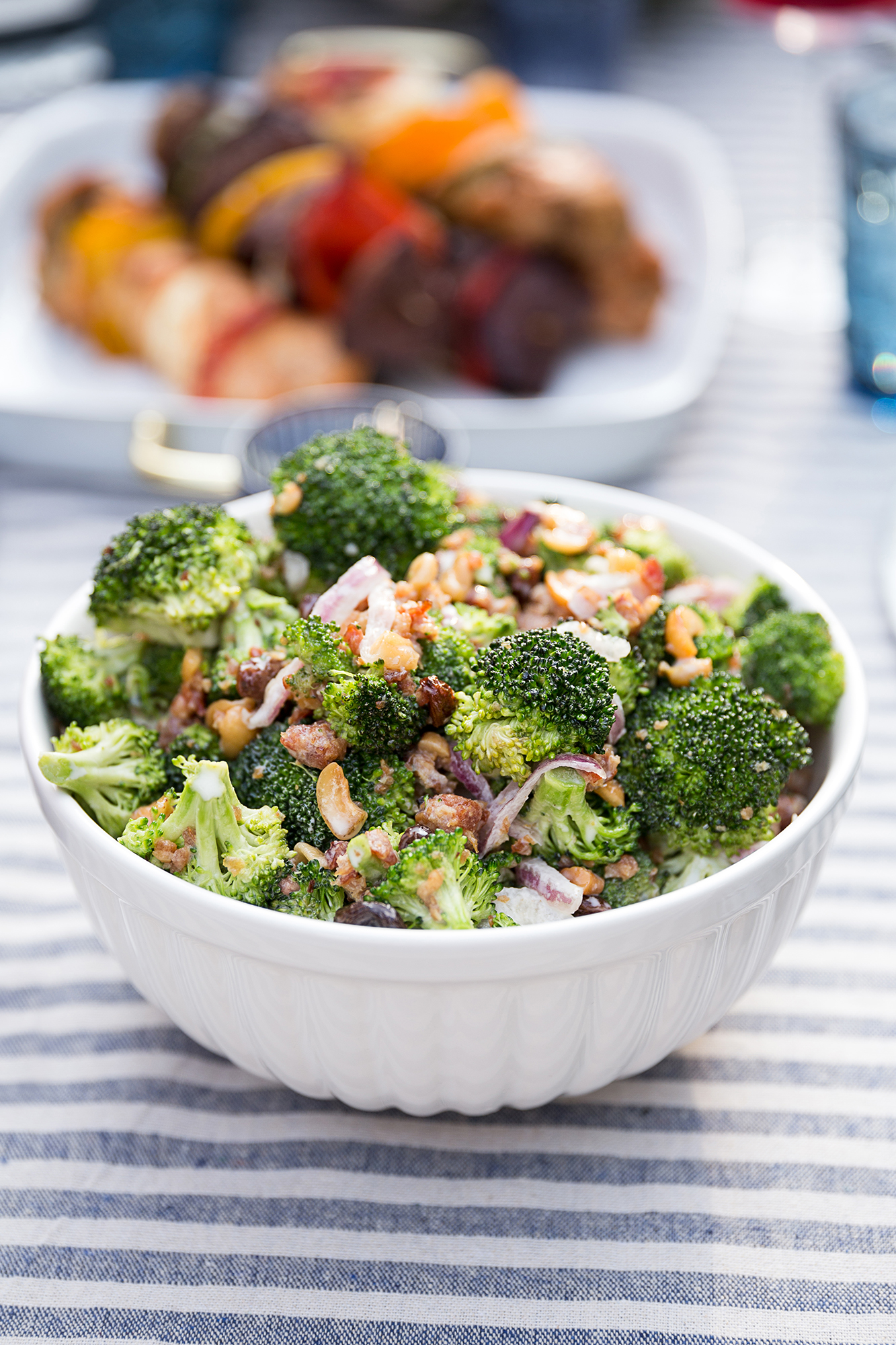 Salads We Love Broccoli Salad in a White Bowl