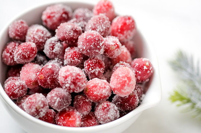 Suagared cranberries in white bowl