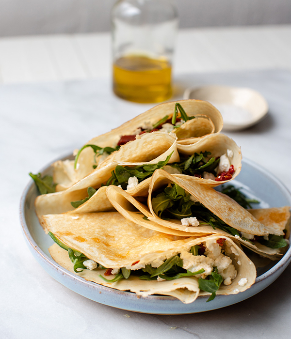 Savory Goat Cheese, Tomato and Arugula Crepes on Plate