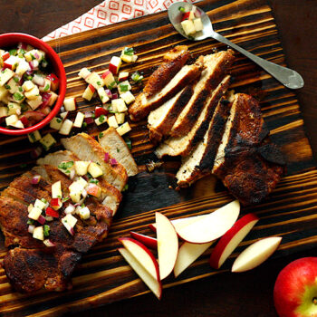 Blackened Pork Chops with Rave Apple Salsa on a Wooden Plank