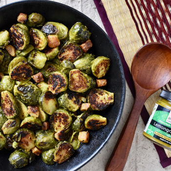 Roasted Brussels Sprouts with Lemongrass in a Black Bowl