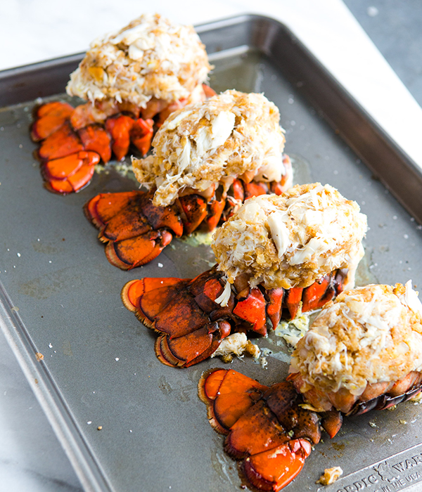 Stuffed lobster tails on a sheet pan