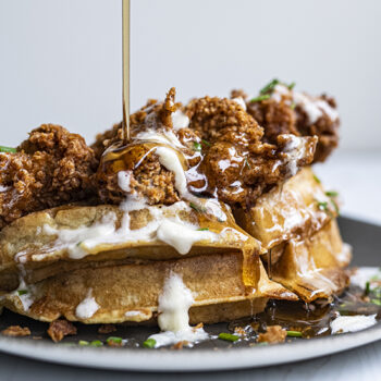 Chicken and waffles with syrup