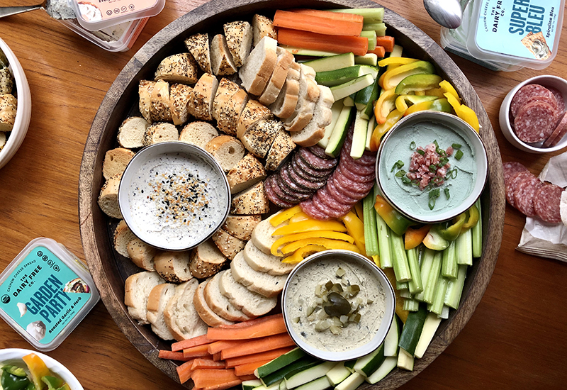 Veggie and bread grazing board with dairy free dips