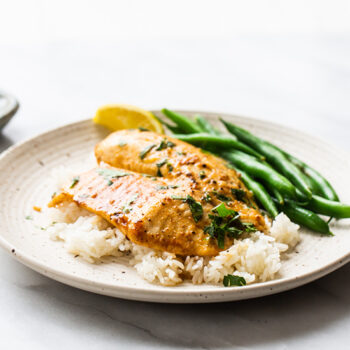 Garlic lemon tilapia served with green beans and white rice