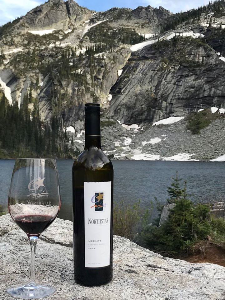 Northstar merlot wine with glass in the mountains