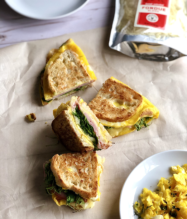 Flipping Good Egg Breakfast Sandwich Slices with Heinen's Fondue Blend