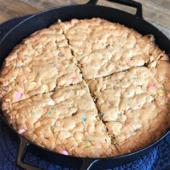 Baked skillet cookie in cast iron pan