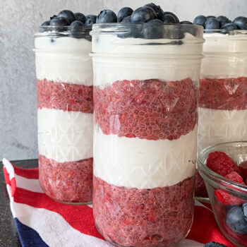 2 Patriotic Parfaits in Jars with a Bowl of Berries