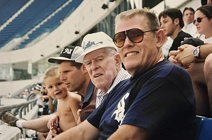 Vienna® Beef’s Tom McGlade (second from left) with his son, grandfather & father at a Chicago White Sox Game
