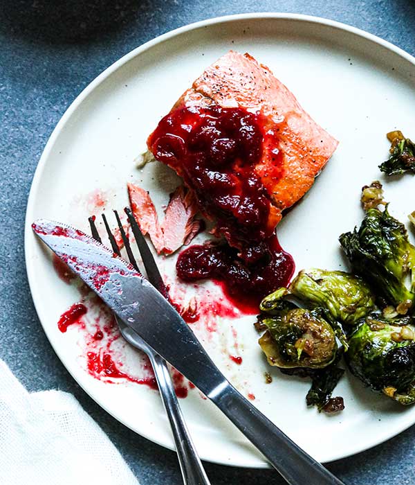 Pan-Seared Salmon with Spiced Cranberry Sauce and Brussels Sprouts Salad